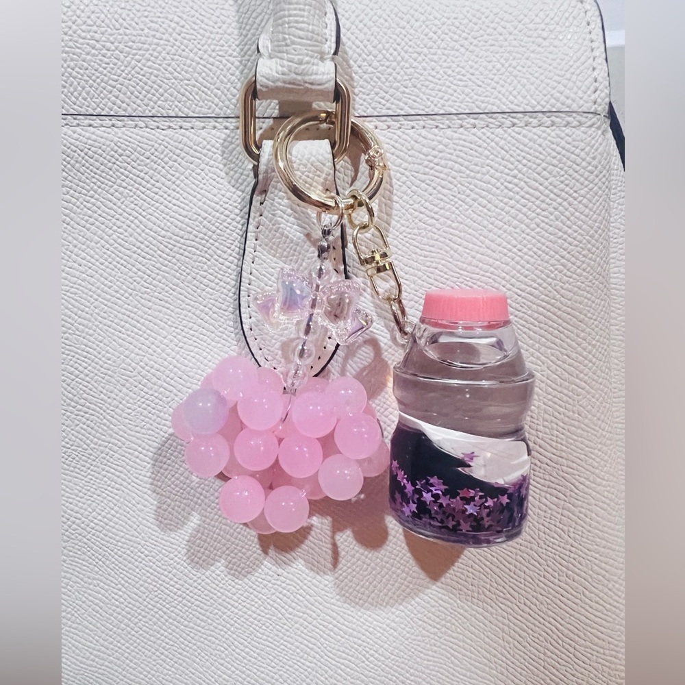 Buy 3 get 1 free.❤️❤️Pink Beaded Heart and Liquid Bottle Bag Charm with pink bow